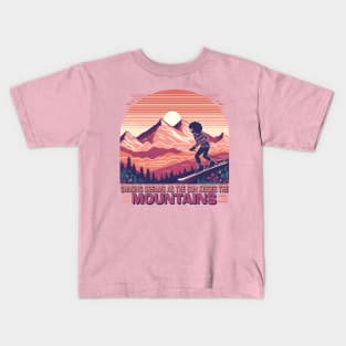 chasing dreams as the sun kisses the mountains Kids T-Shirt